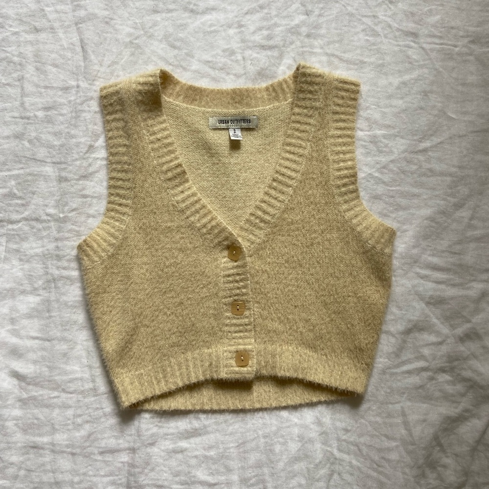 Slightly cropped cream colored vest from urban outfitters